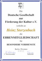 Ehrenmitgliedschaft Urkunde der DGFK berreicht durch Prof. Dr. Norbert Pintsch am 1.5.2001 anlsslich der Ausstellungserffnung "Reale Welten-Surreale Welten" im Centre Bagatelle in Berlin-Frohnau. 